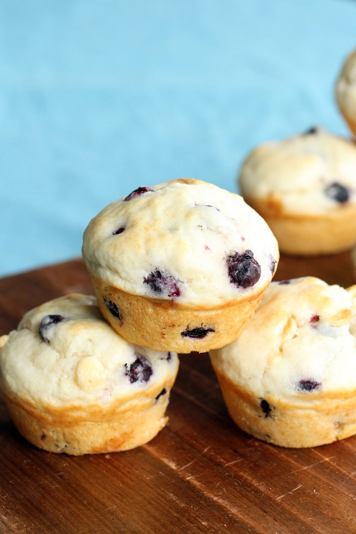 close-up shot of several saskatoon muffins stacked on a table