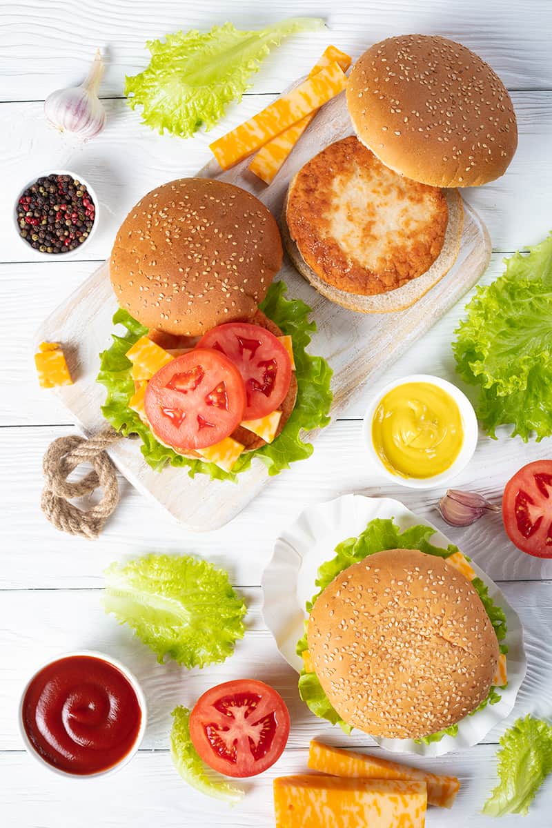 top down shot of Turkey Burgers preparation in a white background