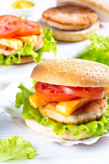 Turkey Burgers with slices of tomatoes and cheese