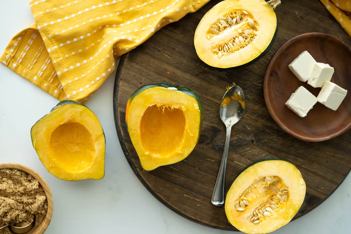 clean out acorn squash on the wooden board