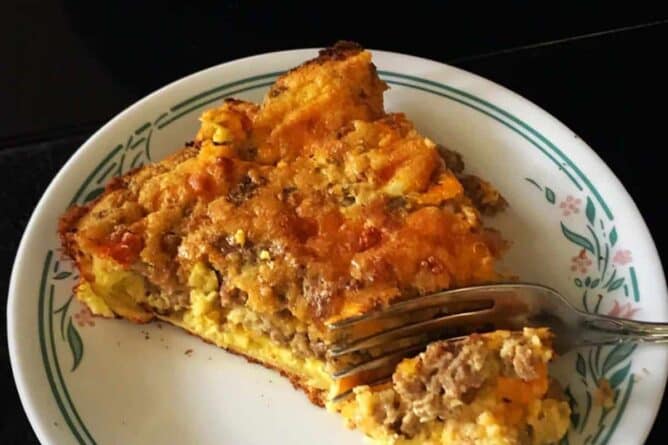 close up of a Slice of Leftover Meatloaf Quiche on a Corelle plate