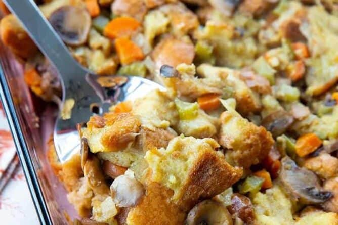 close up Oven Baked Turkey Stuffing with serving spoon