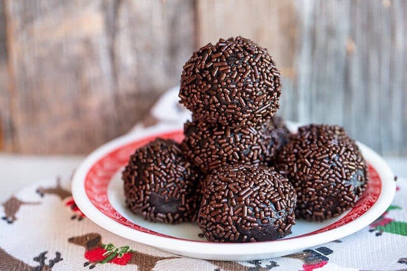 a plate with Chocolate Bourbon or Rum Balls