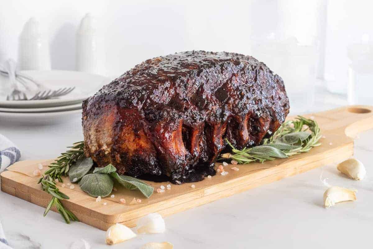 pork rib roast on a wooden board