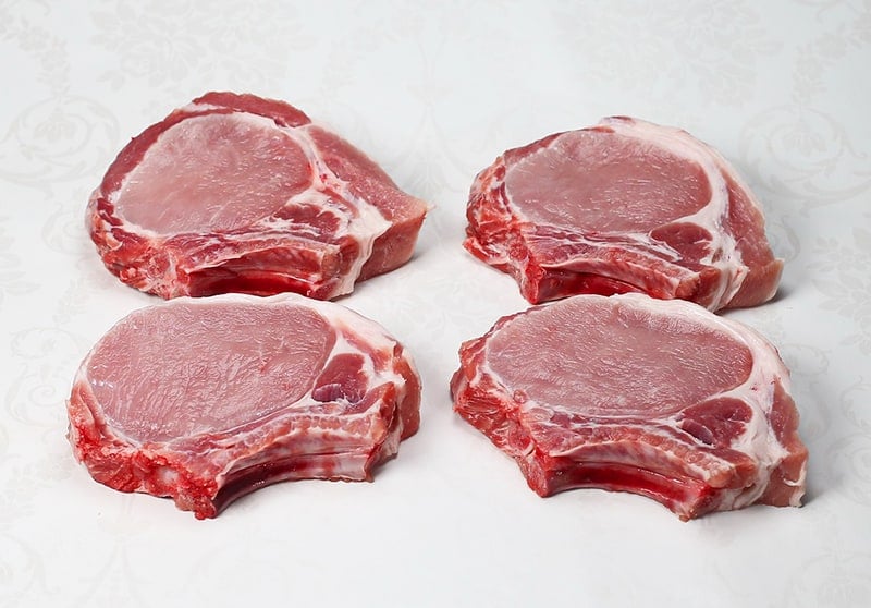 image of 4 pork chops laid out