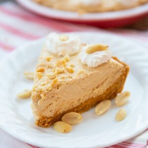 a slice of Classic No-Bake Peanut Butter Pie in a white dessert plate