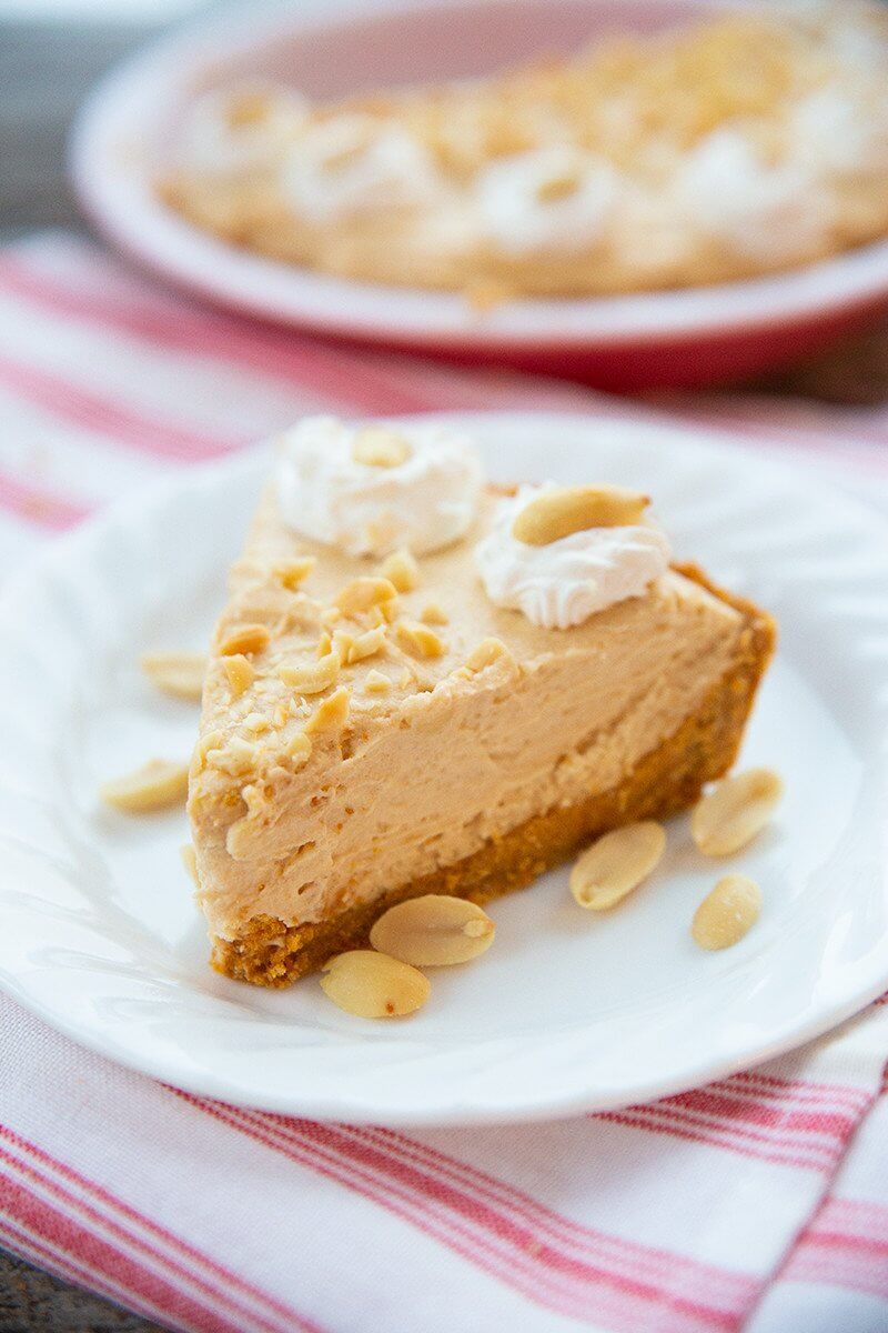  a slice of Peanut Butter Pie on a white plate