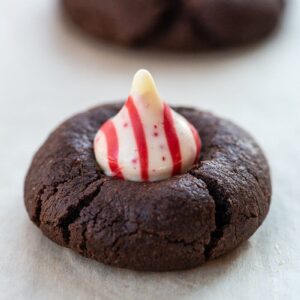 close up Chocolate Cookies with White Chocolate Peppermint Kisses on Top