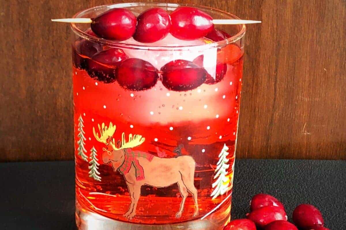 Close up of the Cranberry Rum Ginger Ale in Festive Tumbler.