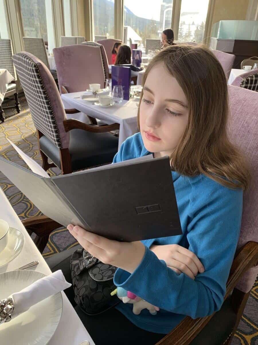 my daughter starring at the menu