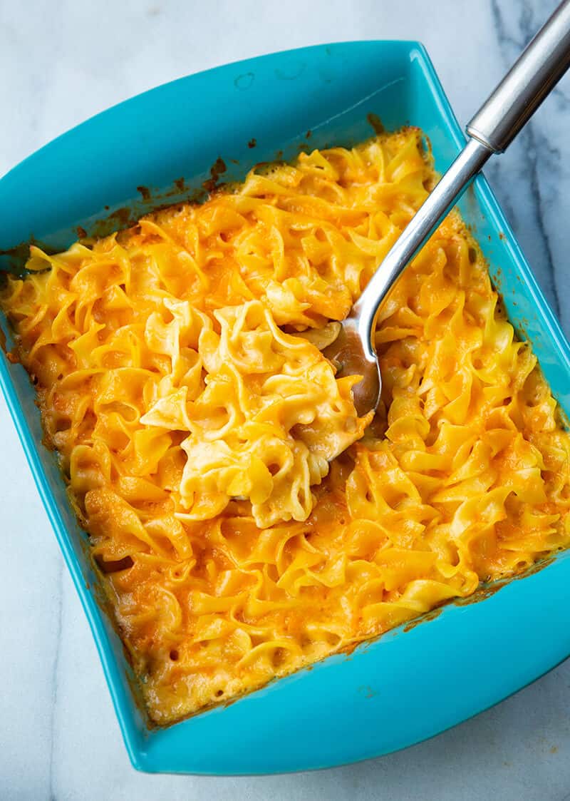 high angle shot of Cheesy Egg Noodles with a spoon
