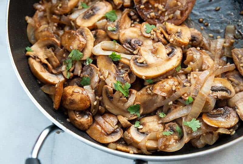 Garlic Balsamic Sauteed Mushrooms and Onions in a large skillet 