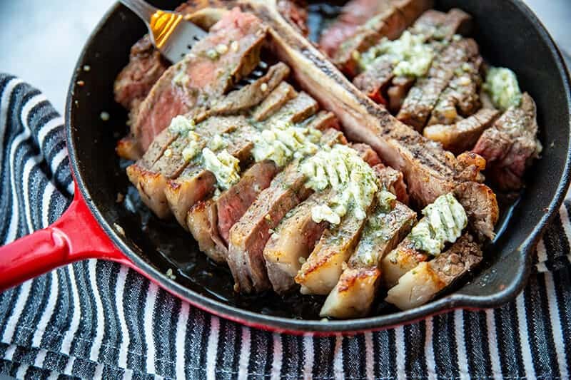 Skillet Porterhouse Steak with Garlic Dill Butter