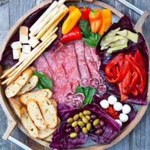 close up Antipasto in a round wooden platter
