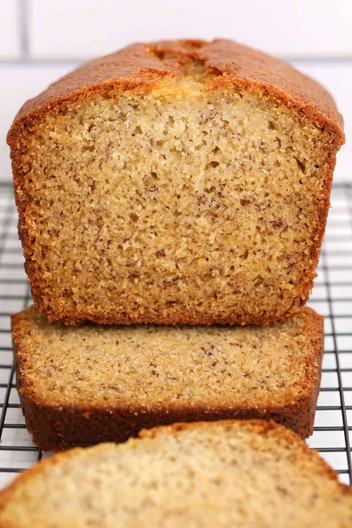 Buttermilk Banana Bread loaf sliced looking at the end of the loaf