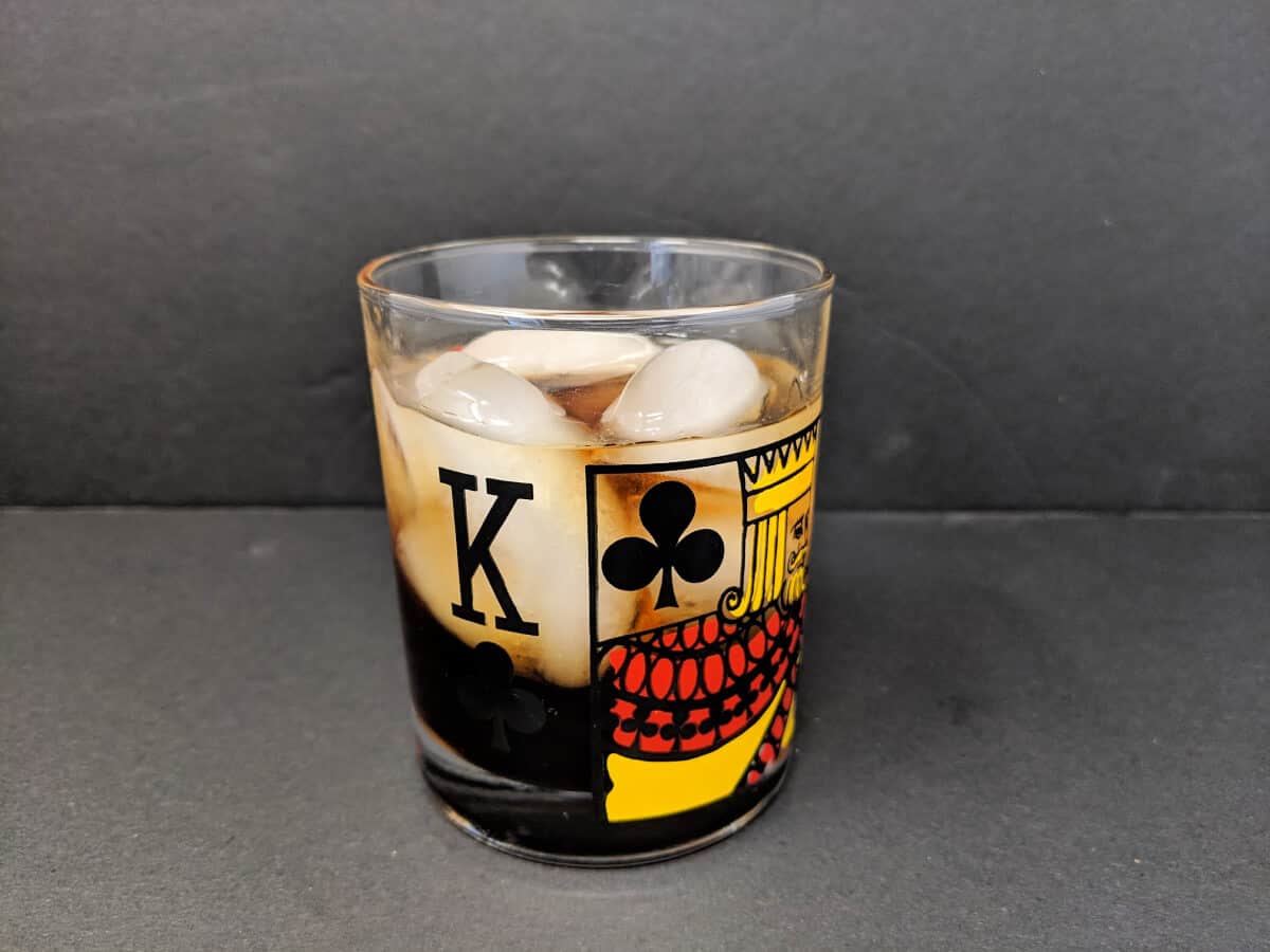 Black Russian drink in an old fashioned glass