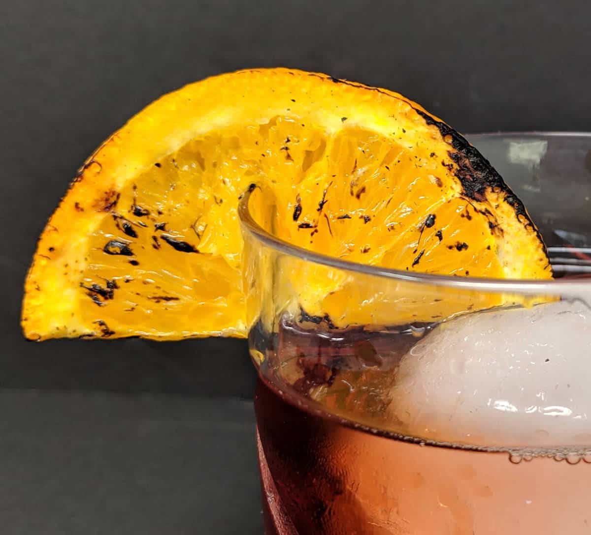 Burnt Orange garnish on a Negroni