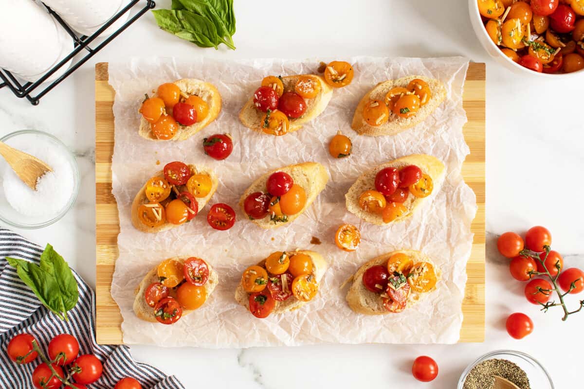 Bruschetta onslicedbaguetts on parchment paper