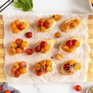 Bruschetta onslicedbaguetts on parchment paper