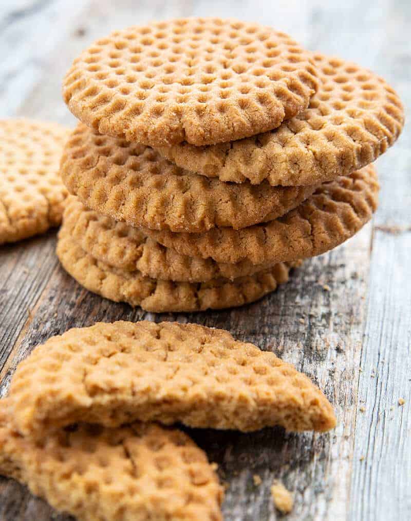 close up stack of Crispy Peanut Butter Cookies in wood background