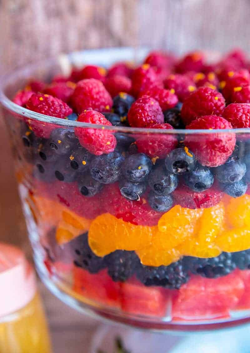 Close up of raspberries, blueberries, mandarin oranges and blackberries 