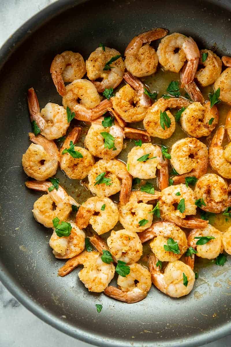 Buttery Old Bay Steamed Shrimp in medium saucepan with melted butter