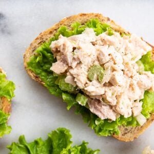 chicken salad on a piece of bread with lettuce