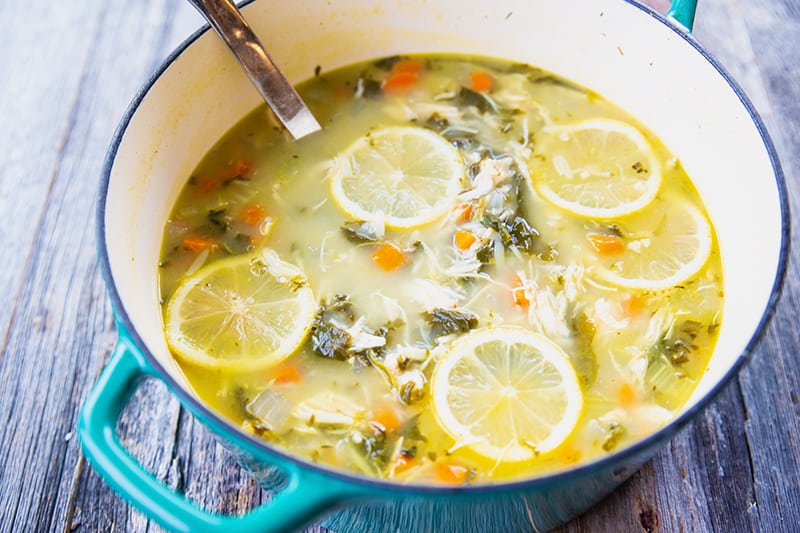Lemon Chicken Soup with Orzo in a large blue pot