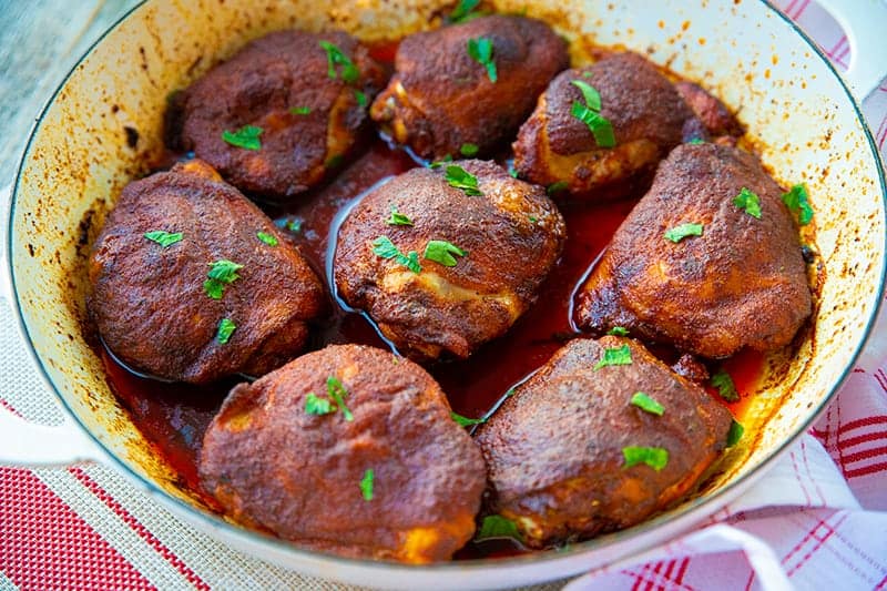 Smoked Paprika Baked Chicken Thighs on a white large bowl