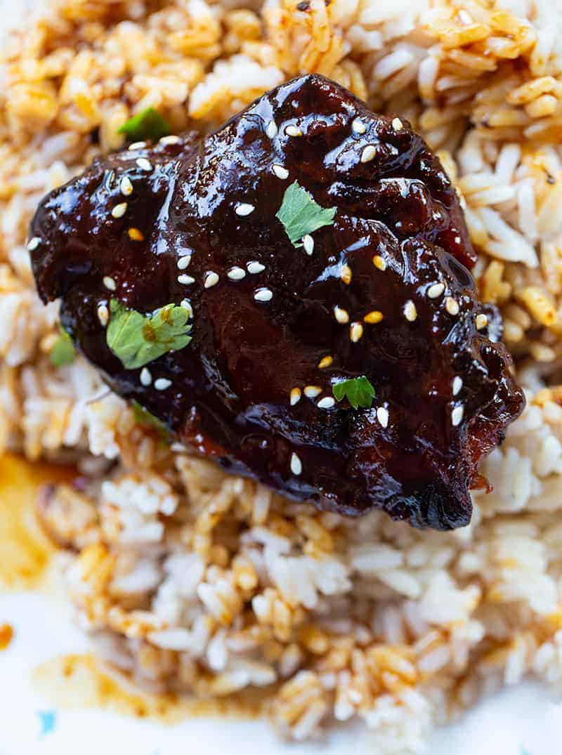 close up Instant Pot Chicken Thighs on rice with Honey Garlic sauce