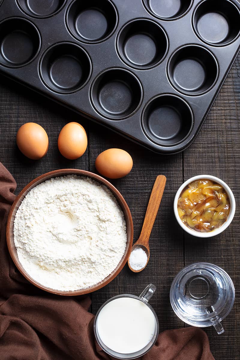 muffin tin and ingredients for Traditional Yorkshire Pudding 