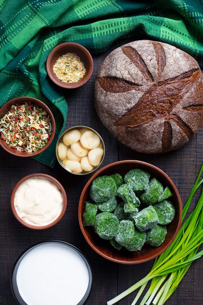 Knorr Spinach Dip Ingredients on wood background with green tablecloth