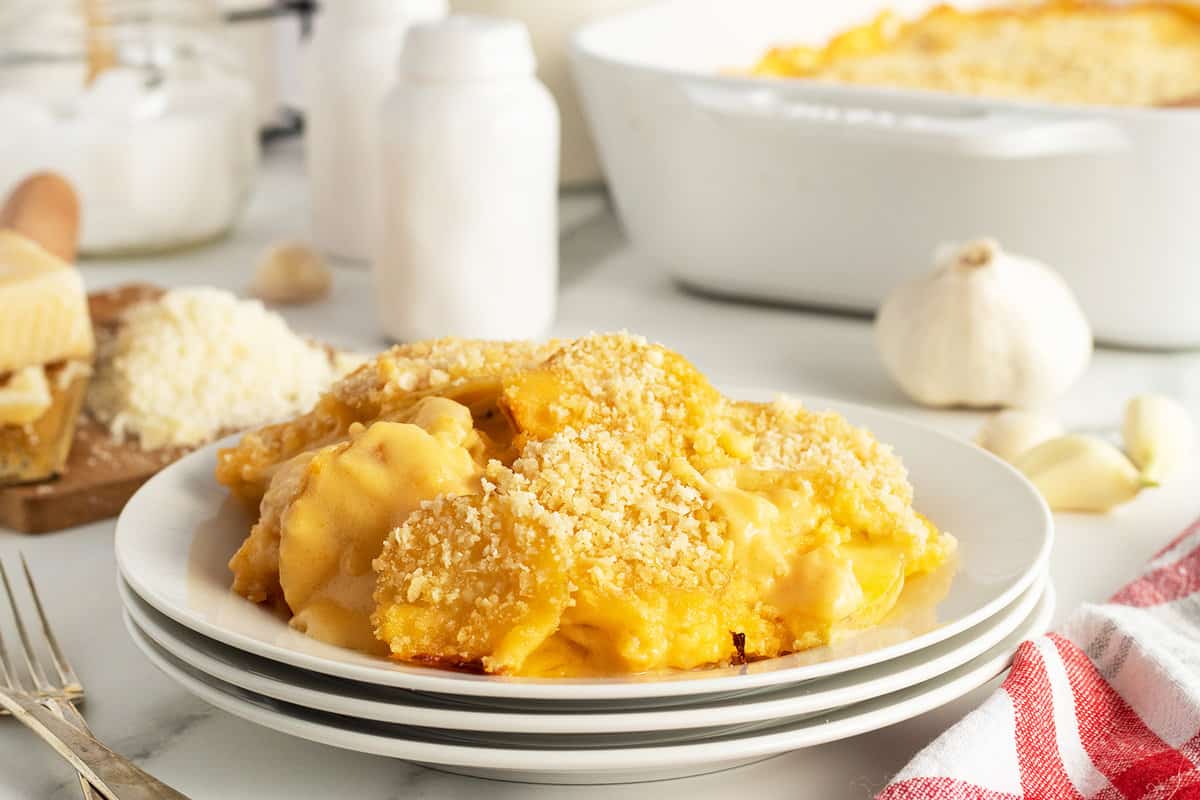 Sliced potatoes baked in creamy cheese sauce.
