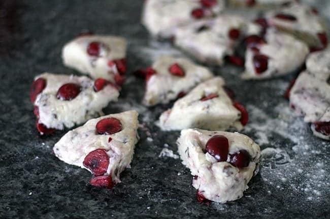 six pieces of cherry scones dough disk cut equally
