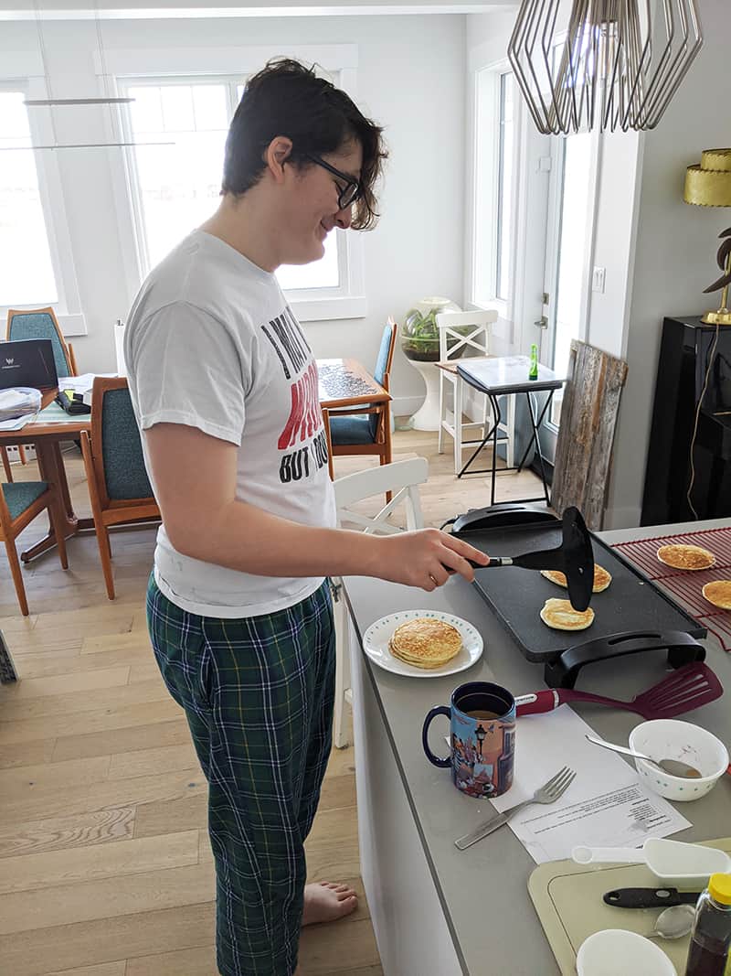 cooking the cottage cheese pancakes on a griddle