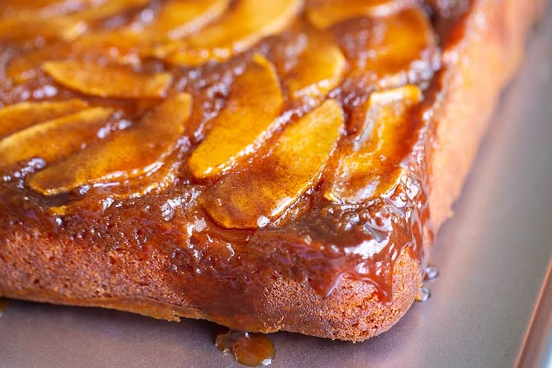 close up delicious upside down apple cake with decadent brown sugar caramel and apple cinnamon toppings