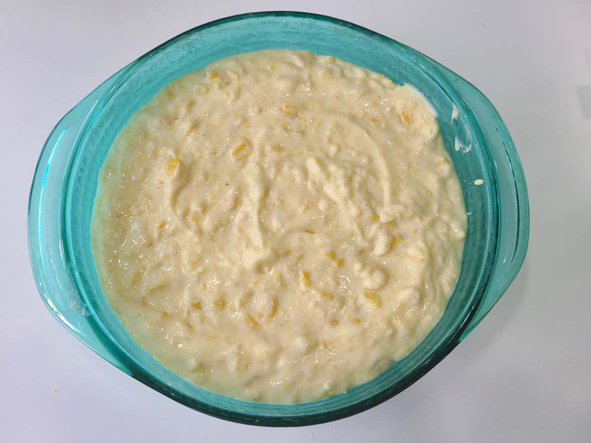 corn casserole batter in a turquoise bowl