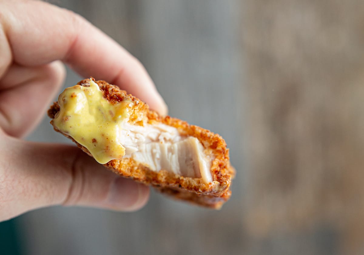 the inside of a properly of cooked chicken strip 