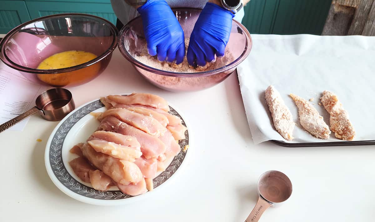 preparing chicken strips 