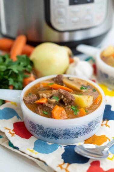 Instant Pot Beef Stew in a bowl with handle