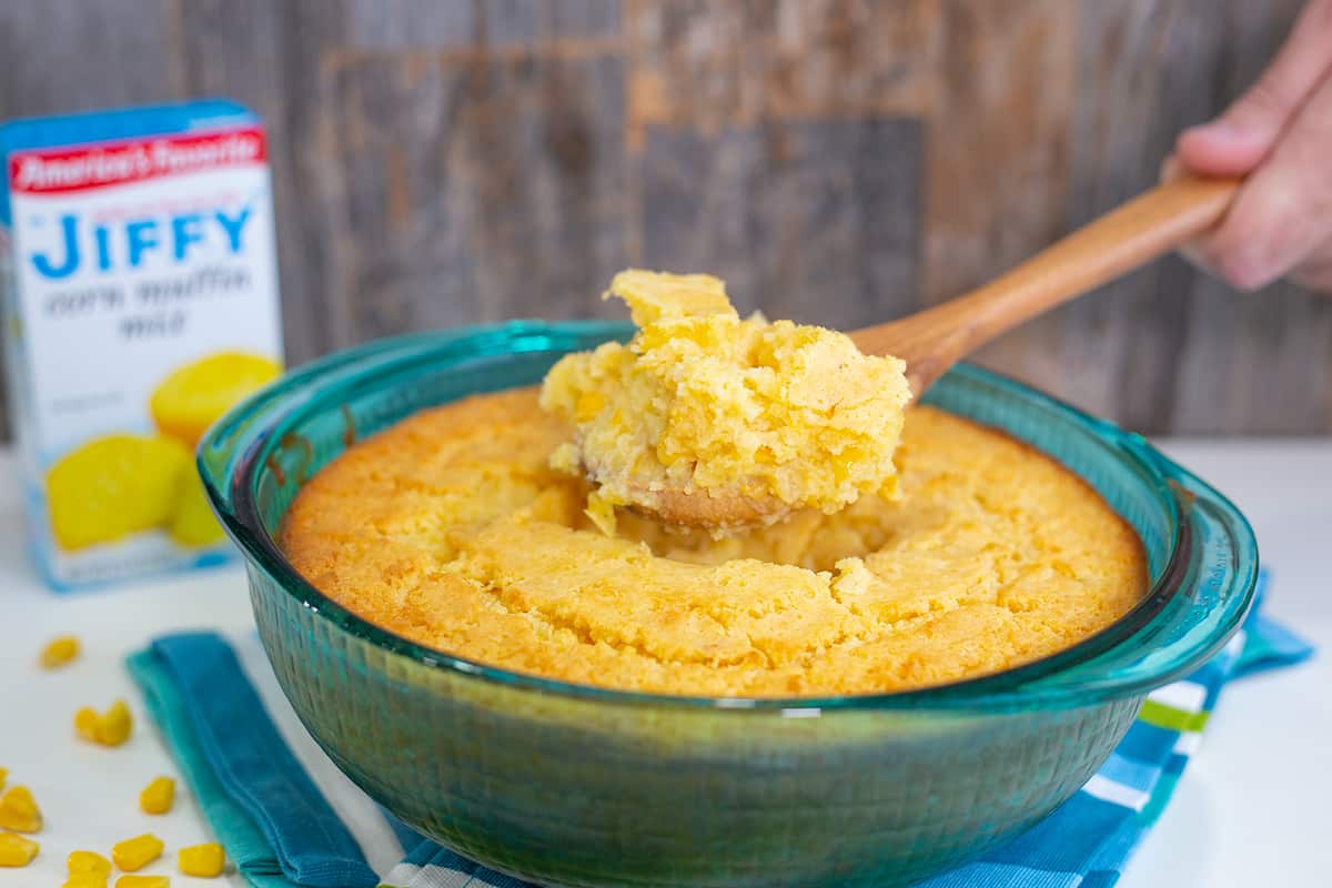 Jiffy Corn Casserole in a blue pyrex bowl