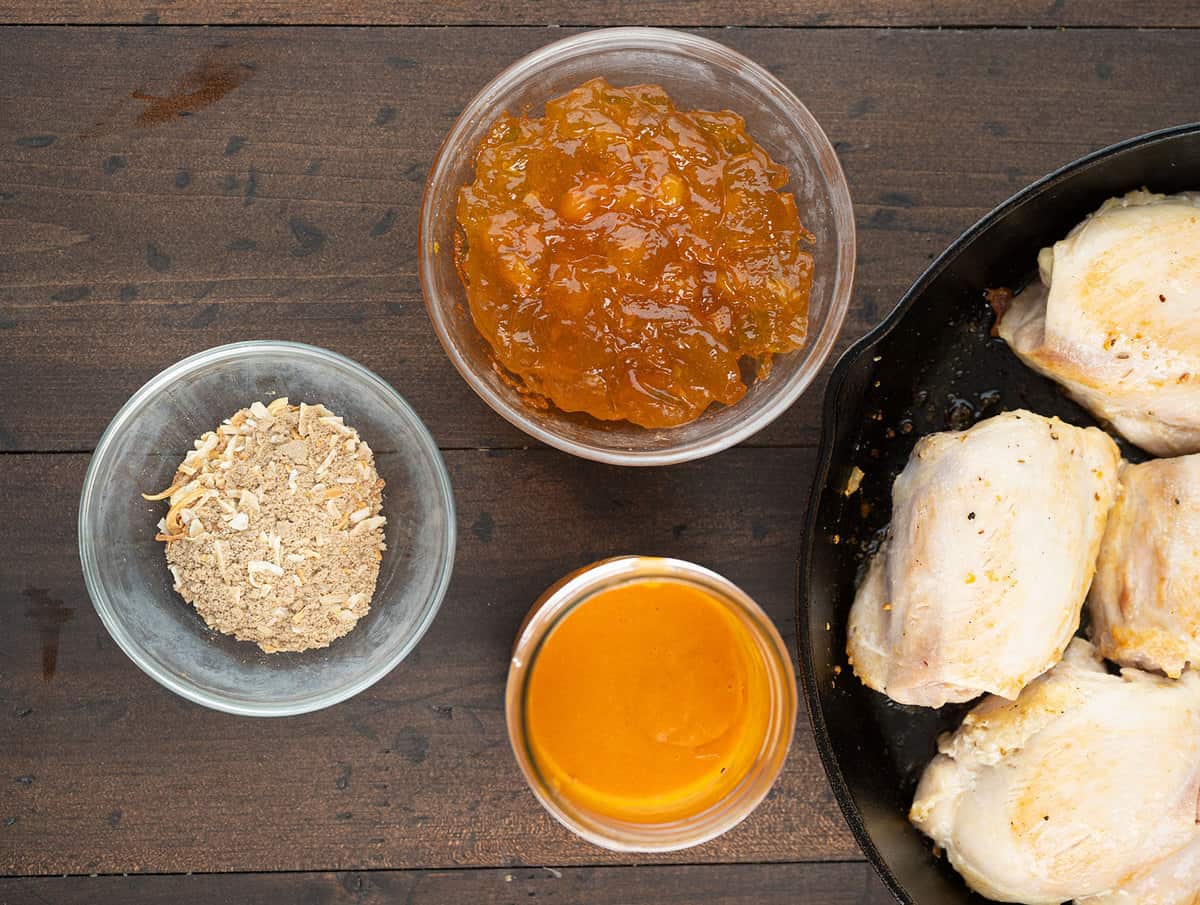  Apricot Chicken ingredients on a wooden board