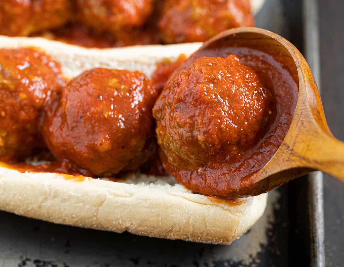 meatballs in pasta sauce on a bun