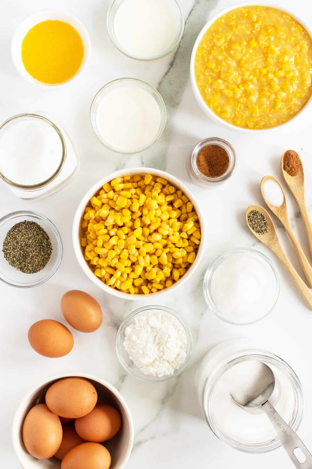 creamy corn pudding ingredients in small bowls