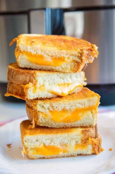 https://www.thekitchenmagpie.com/wp-content/uploads/images/2021/01/AirFryerGrilledCheese1-378x570.jpg