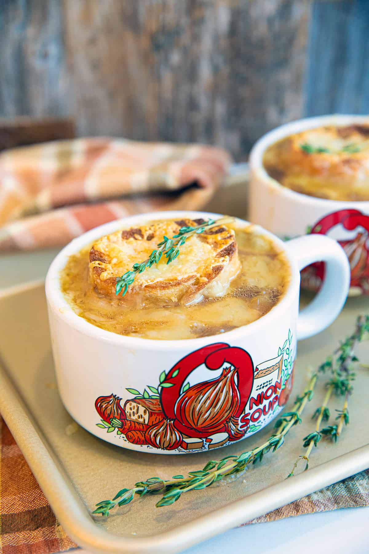 French Onion Soup in a white handled bowl