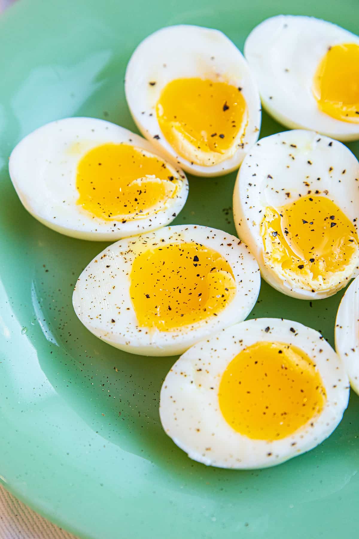 sofr boield eggs on jadeite plate 