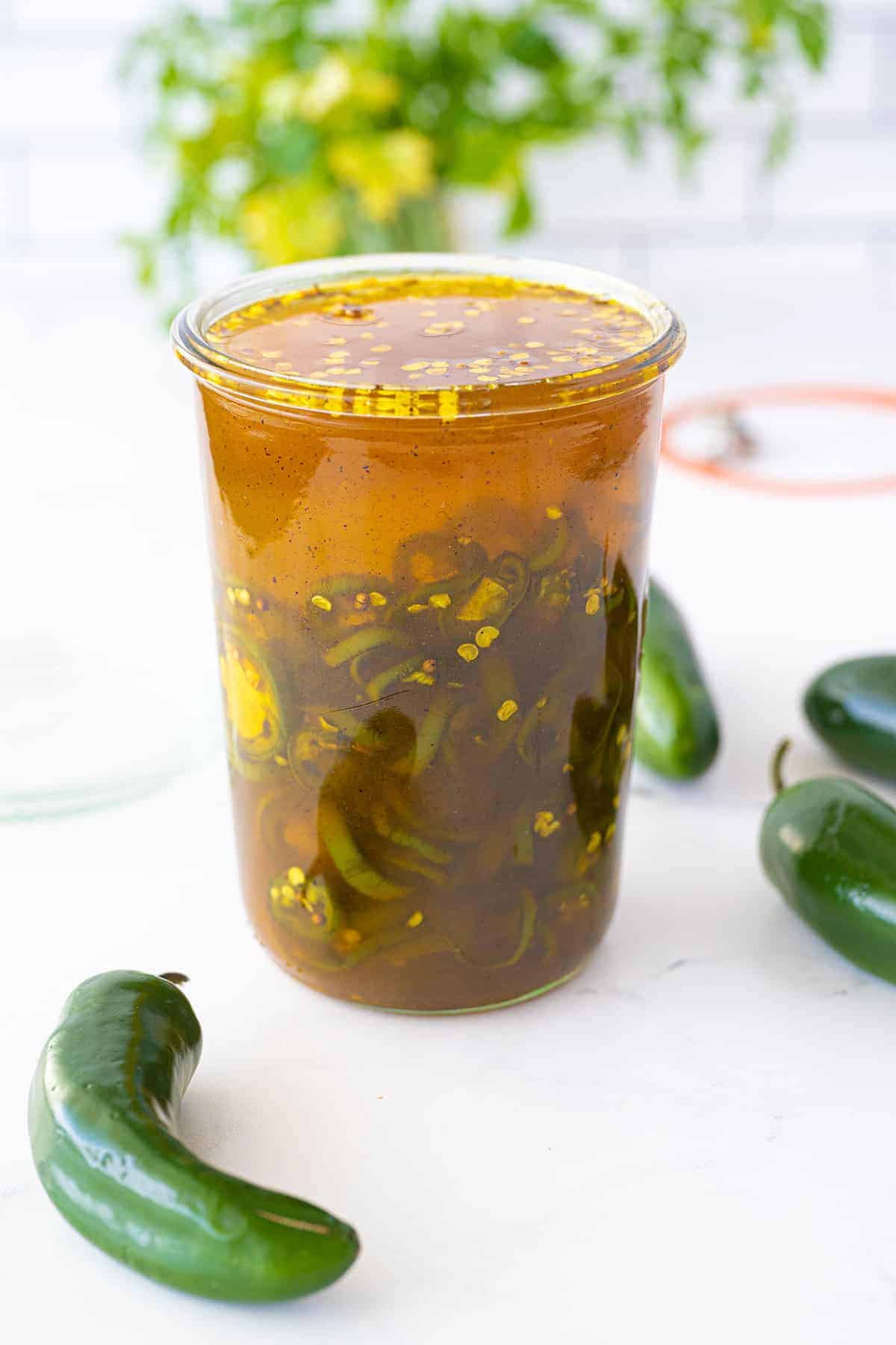 candied jalapenos in a jar