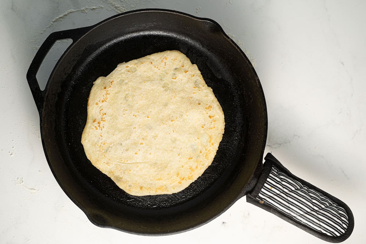 Potato Lefse in a cast iron skillet