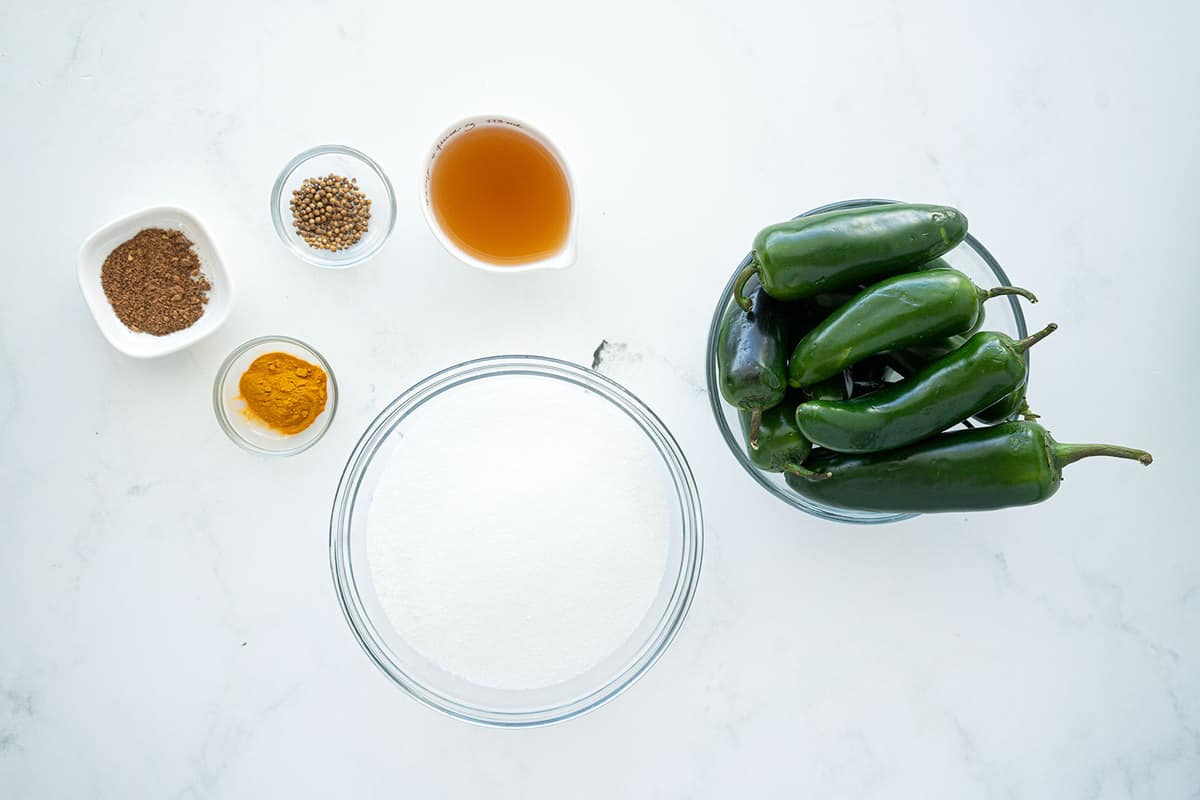 Candied Jalapenos ingredients on white marble